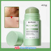 A tube of Barubt Mugwort Acne Clay Stick in light green packaging with a close-up of skin texture.