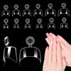 A set of medium clear almond acrylic nail tips displayed next to a hand for scale.