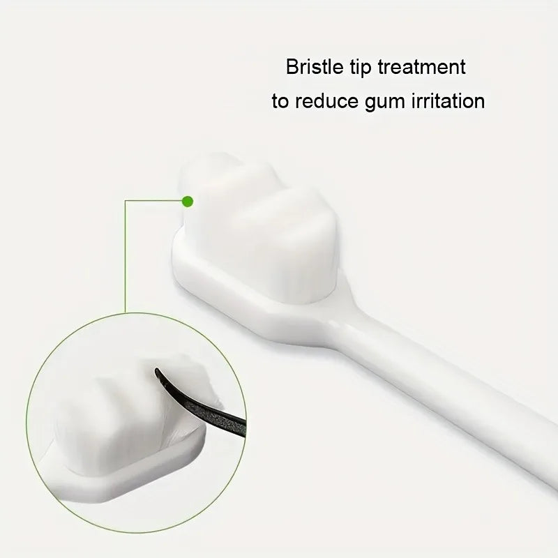 A white toothbrush with a bristle tip is shown next to a magnified view of the soft bristles for gum treatment.