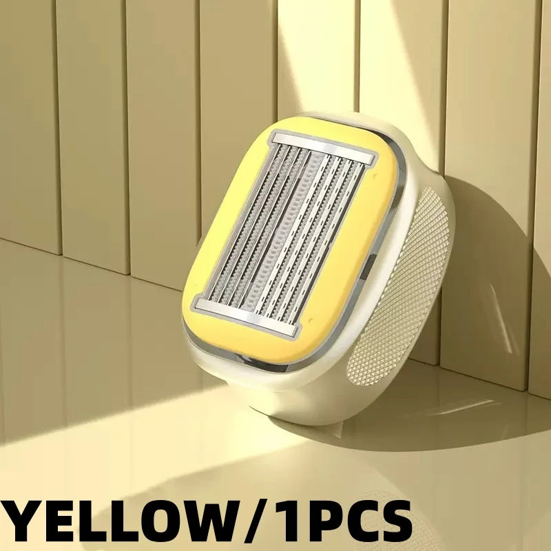 A yellow precision manual safety razor is shown on a light surface with vertical shadows.