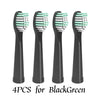 Four replacement toothbrush heads in black and green for BlackGreen electric toothbrushes