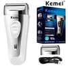 A white Kemei professional electric shaver with a black handle and charging cable.