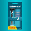 Packaging for a Gillette razor featuring three blades and promotional text.