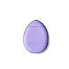 A purple mini finger puff foundation applicator tool with a rounded, oval shape.