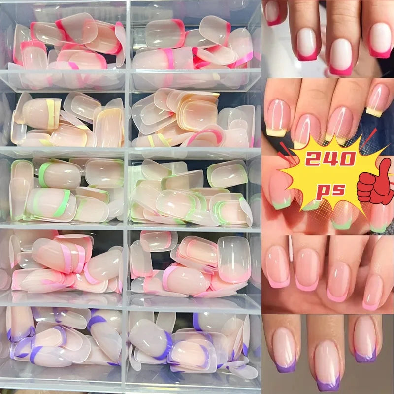 Collection de faux ongles colorés dans diverses nuances et designs pour une manucure acrylique.