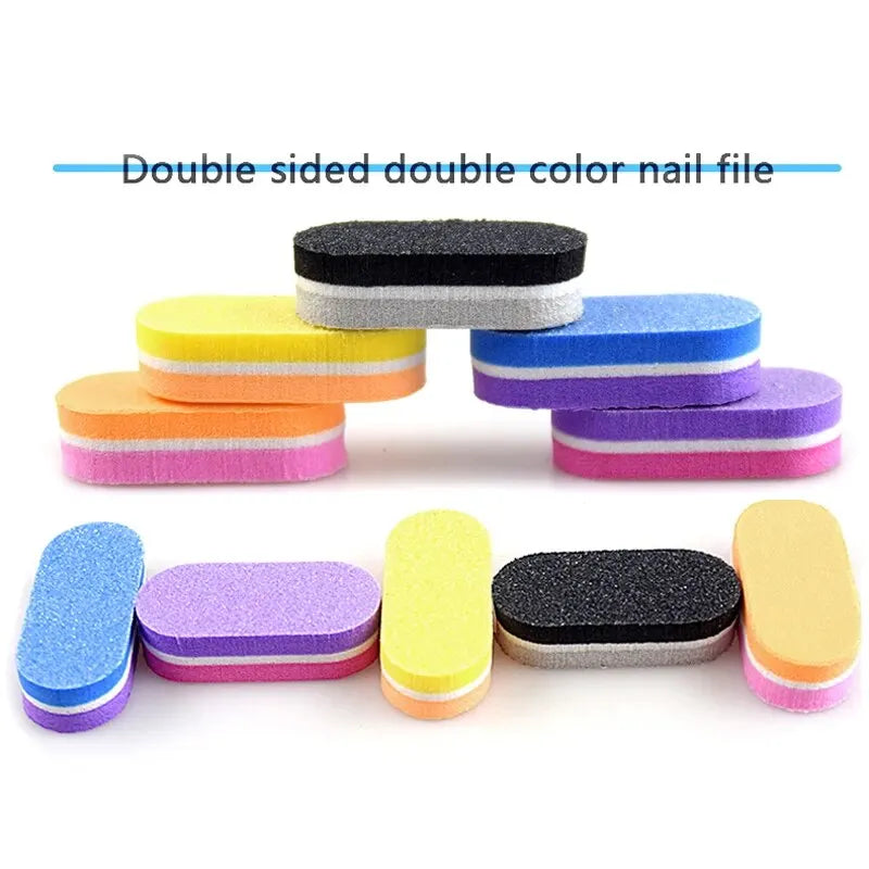 A collection of double-sided, double-color nail files in various colors like yellow, orange, purple, and gray.