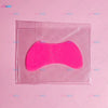 A pink silicone lash lift shield eye pad is sealed in a clear plastic pouch.