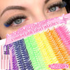 A close-up of an eye showing a variety of colorful cluster false eyelashes and a box labeled 240PCS