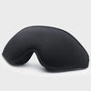 A black comfortable 3D sleeping eye mask shown from the side.