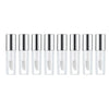 A row of ten clear glass lip gloss tubes with silver caps, used as mini empty containers for DIY cosmetics.