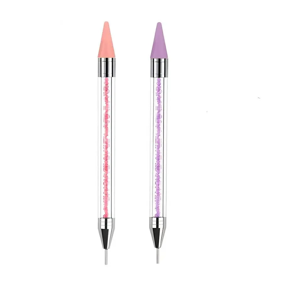 Une paire d'outils à pinces en strass à double extrémité, un rose et un violet.