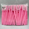 Un lot de bandes de tondeuse à sourcils roses emballées dans un sac plastique transparent.
