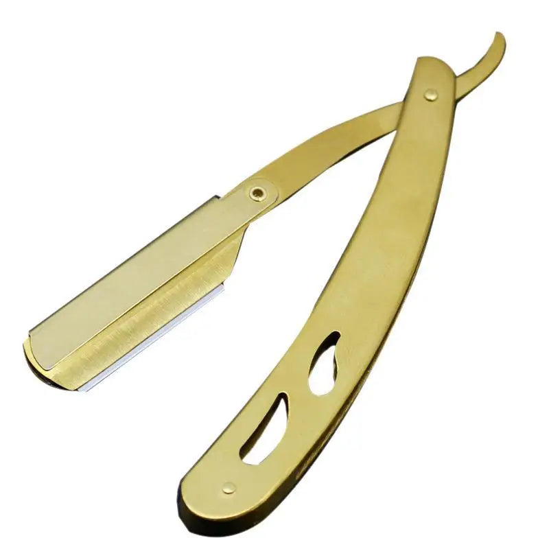 A gold-toned professional stainless steel straight edge barber razor with a curved blade and handle.