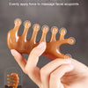 A hand is applying pressure to an eight-point facial massage tool, demonstrating even force application.