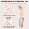 A pink portable electric hair shaver and epilator with an automatic fill light feature.