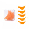 An orange 3D eyelash curler and lifting kit with multiple curved plastic tools.