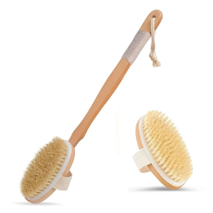 A wooden body exfoliating brush with a long handle and natural bristles.