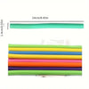 A set of soft foam heatless hair rollers in various shades of green and yellow.