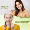 A woman demonstrates a portable dental floss toothbrush set for on-the-go use and orthodontics.