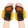 A person's ankle is being massaged by a dual airbag device with orange and black components.