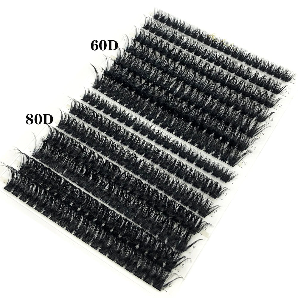 A tray of black false eyelashes, labeled 60D and 80D, displayed diagonally.
