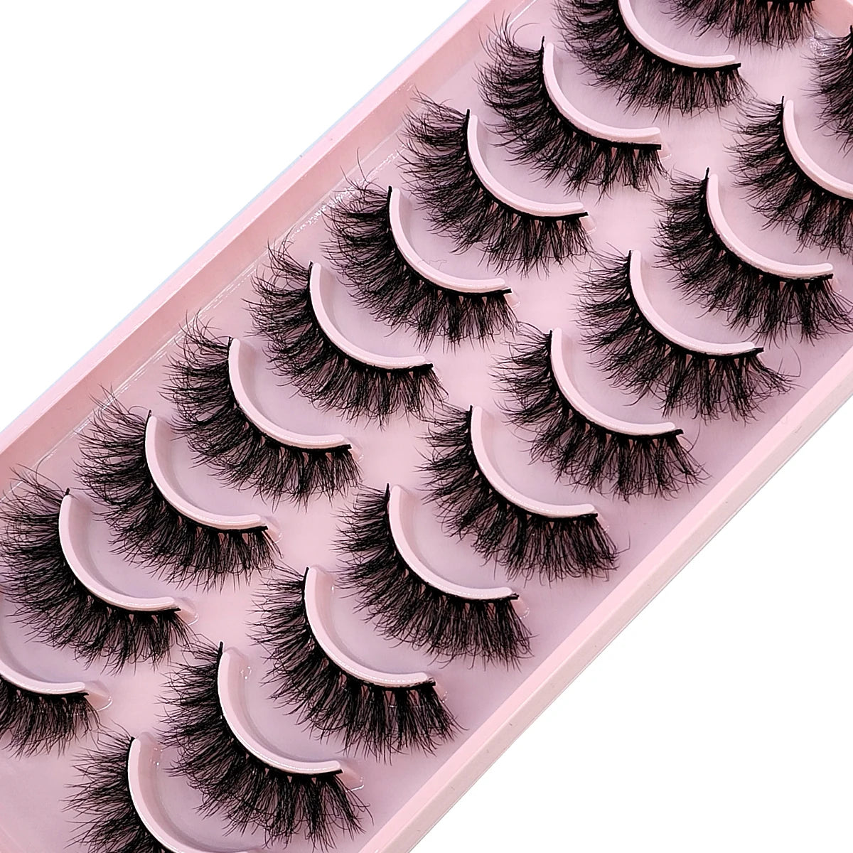A tray of ten pairs of black false mink eyelashes arranged in a row.