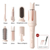 A set of pink ceramic hair styling tools including a straightener comb, a wavy curling iron, and a main curler.