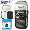 A black Kemei KM-2026 electric shaver with a silver head and accessories shown on a white background.