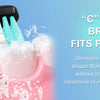 A pink toothbrush with light blue bristles and white cleaning foam is shown, demonstrating the C-shaped bristles fitting perf
