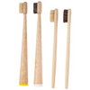 A set of four natural bamboo toothbrushes, including different bristle types and handles.