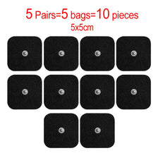 Dix tampons en silicone noirs pour un stimulateur musculaire TENS, emballés en cinq paires de sacs.