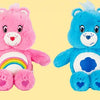 A pair of 33cm Classic Care Bears plush stuffed animals, one pink and one blue.