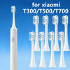 Replacement toothbrush heads for Xiaomi T300, T500, and T700 models shown next to a full brush body.