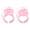 Pink disposable glue rings for eyelash extensions and nail art, shown with dimensions.