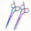 A pair of professional 6-inch stainless steel hairdressing scissors with iridescent pink and blue blades.