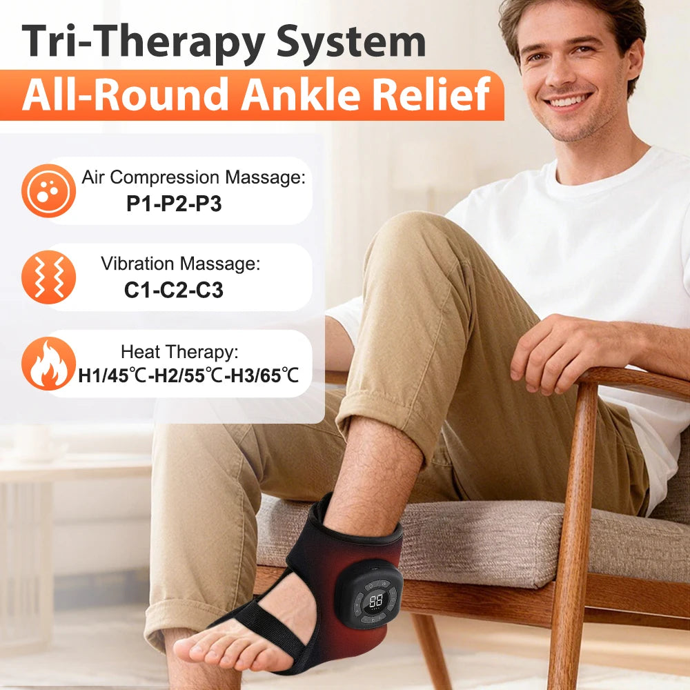 A man is using a black ankle foot massager on his leg while sitting on a wooden chair.
