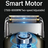 Close-up of a smart motor mechanism for a portable rechargeable electric foil shaver with adjustable speed settings.