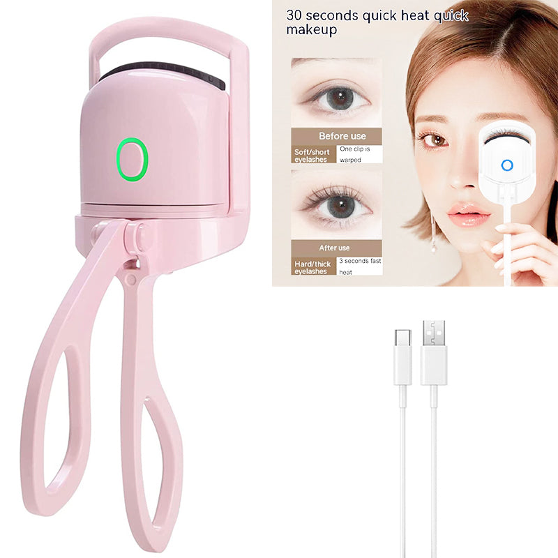 A pink electric heated eyelash curler device with a clamp and a separate heating tool is shown next to a woman applying makeu