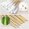 A set of natural bamboo cotton swabs and premium cotton balls shown for use.