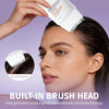 A woman is using a white brush head from a scalp care serum on her hair, demonstrating fast absorption.