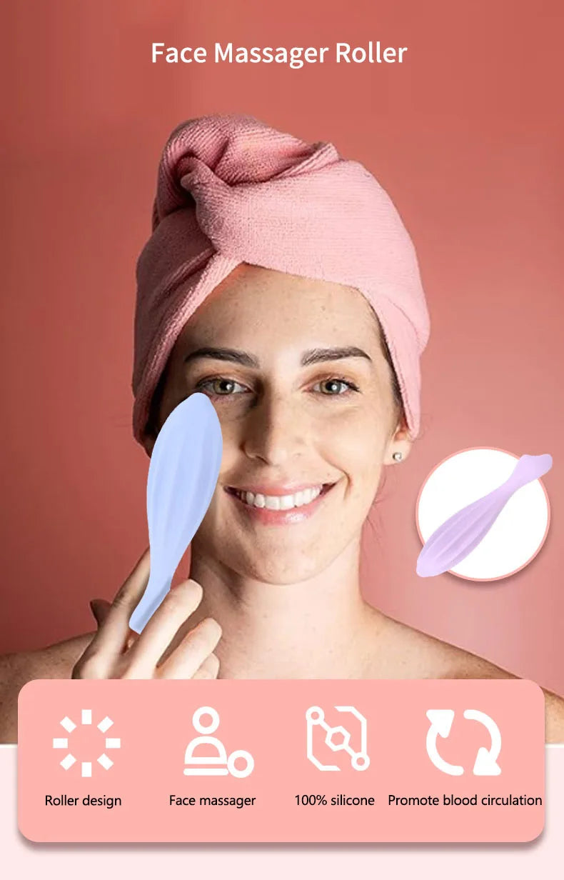 A woman is using a pink silicone face massager roller for facial massage and blood circulation.