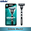 Gillette Mach3 electric shaving razor shown in packaging and standalone view.