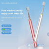 A pink and silver sonic vibrating toothbrush with multiple cleaning modes displayed against a light blue background.