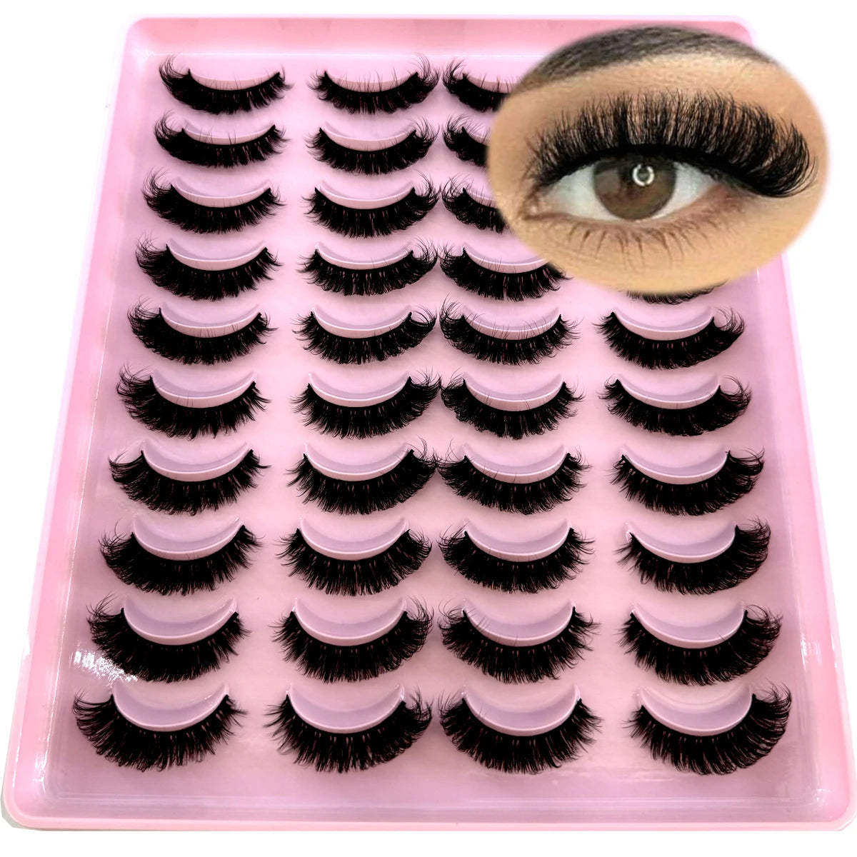 Un plateau rose contenant un kit de faux cils de renard naturels pour le maquillage des yeux.