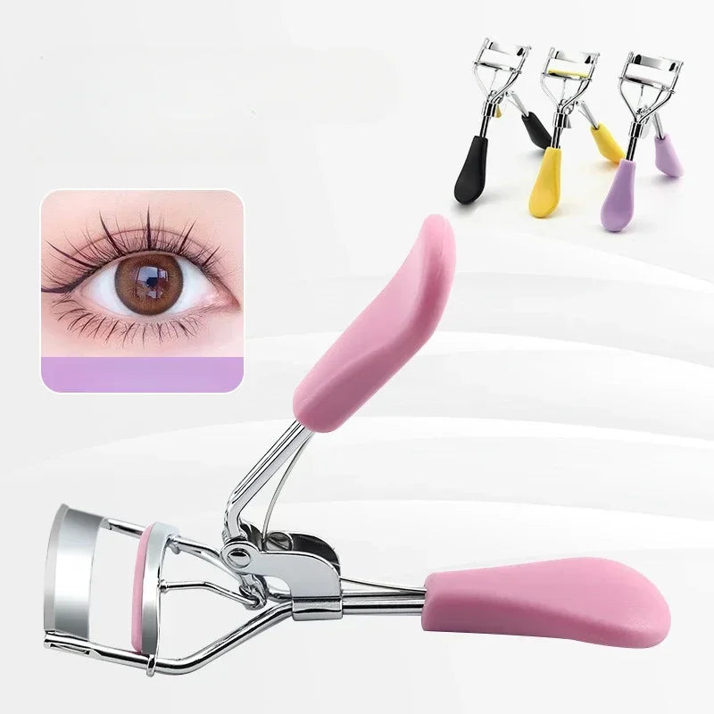 A silver eyelash curler with a pink handle and several interchangeable curler tips is shown.