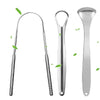 A set of stainless steel tongue scrapers, including a long curved scraper and a spoon-shaped scraper.