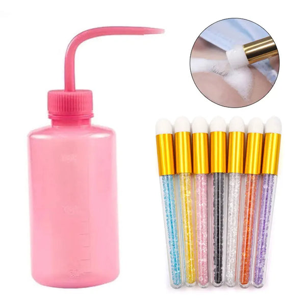 Pink bottle of eyelash extension cleaning solution with a precision applicator brush and a close-up view of the brush tip