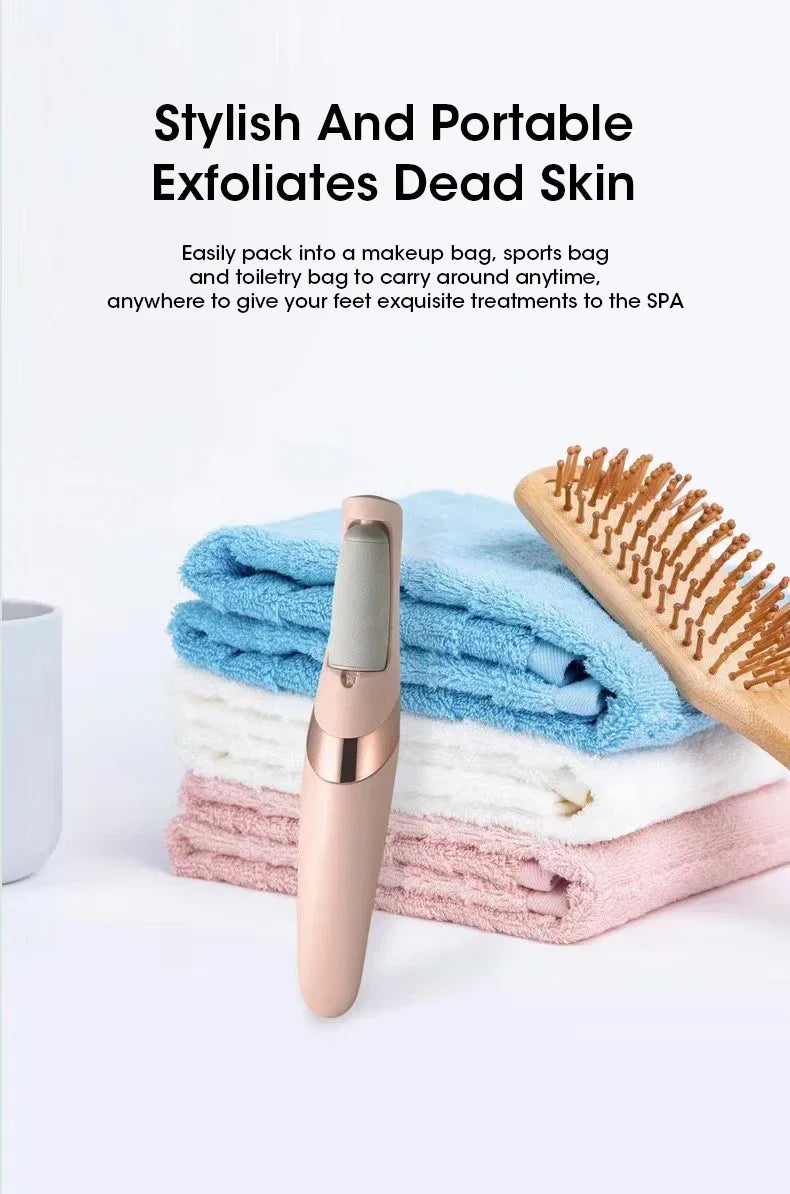 A pink automatic electric foot grinder is shown next to stacked blue, white, and pink towels.