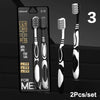 Un set de deux brosses à dents professionnelles à poils doubles dans un emballage noir et blanc.