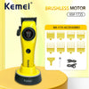 A yellow Kemei brushless motor hair clipper with accessories displayed on a light yellow background.
